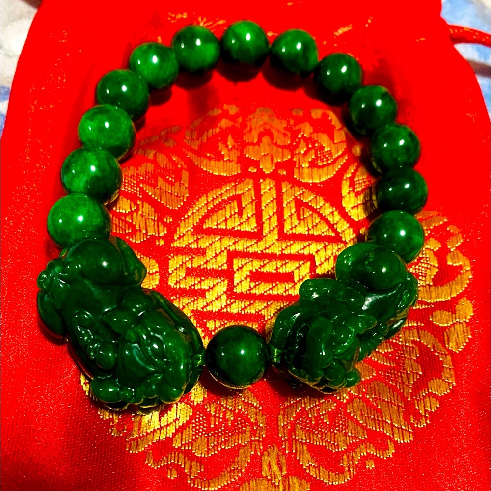 Authentic Jade stretchy Bracelet in 10mm. With double Pi Xiu for protection.
